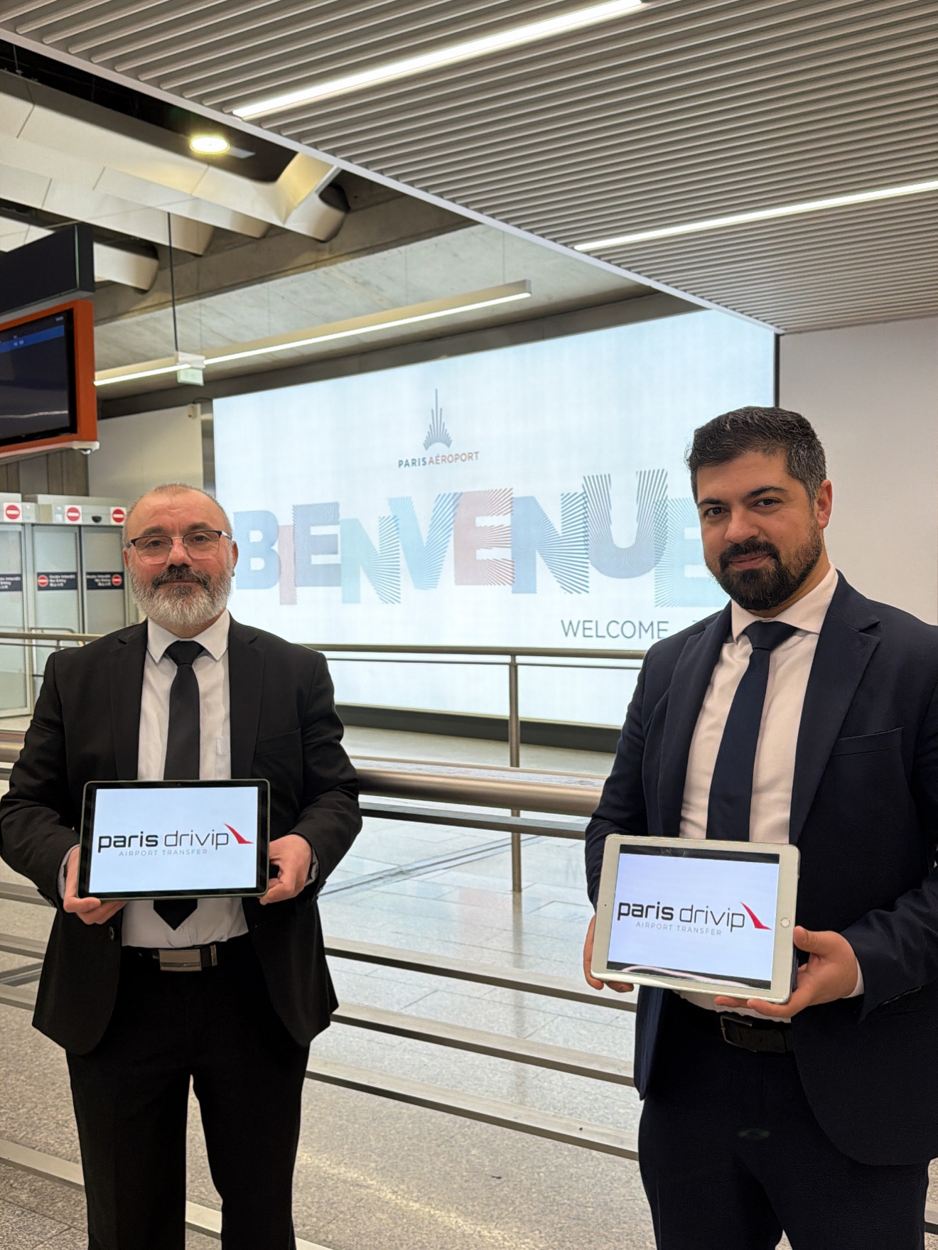 Personalised name tablet — your chauffeur waits inside the terminal